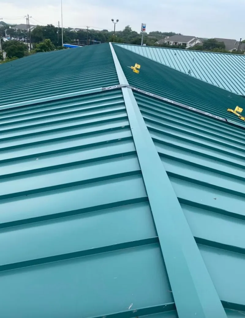 Green commercial metal roof ridge and valley for Metal Roof Repair in Aston